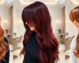 Trois femmes arborent des chevelures magnifiques : une teinture rousse sur brune vibrante, une autre d'un rouge profond, et la dernière avec des reflets cuivrés.