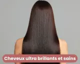 Cheveux longs et lisses, d'un brun profond, reflétant la lumière. Le secret pour savoir comment avoir des cheveux brillants et sains.