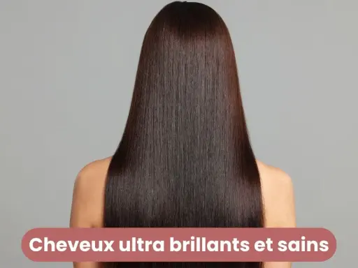 Cheveux longs et lisses, d'un brun profond, reflétant la lumière. Le secret pour savoir comment avoir des cheveux brillants et sains.