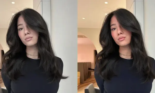 Une jeune femme aux cheveux bruns et brillants, pose avec un sourire subtil. Elle porte un col roulé noir et des colliers fins. On se demande combien de temps dure un gloss cheveux pour obtenir un tel éclat.